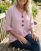 Janet | V-Neck Blouse with Wooden Buttons and Ruffled Sleeves