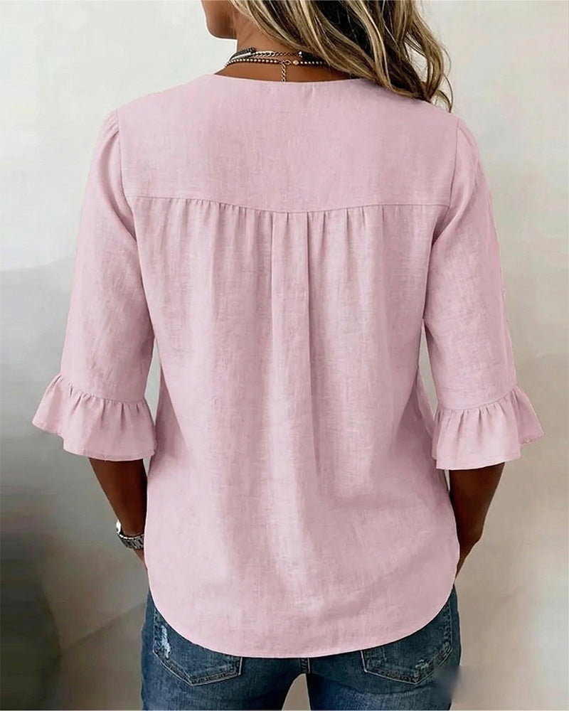 Janet | V-Neck Blouse with Wooden Buttons and Ruffled Sleeves