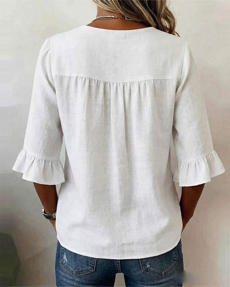 Janet | V-Neck Blouse with Wooden Buttons and Ruffled Sleeves