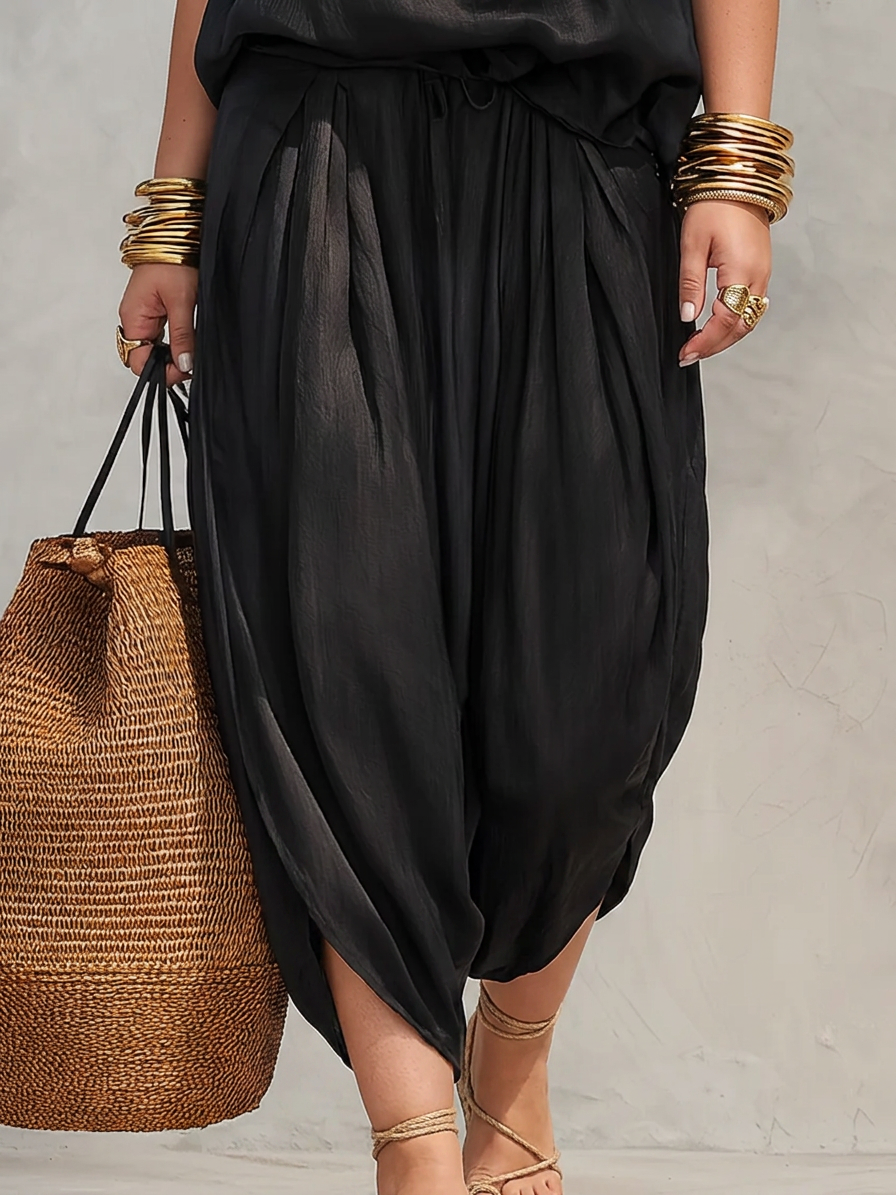Aurora – Sleeveless top with American collar and pleated pants