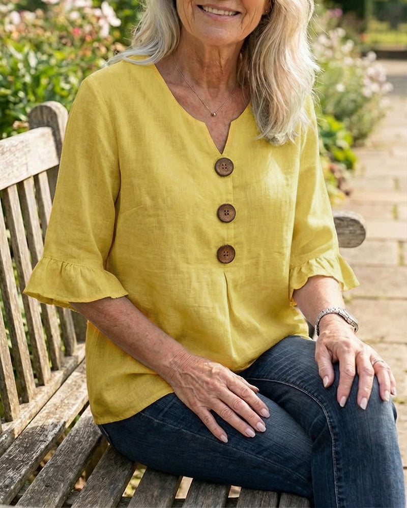 Janet | V-Neck Blouse with Wooden Buttons and Ruffled Sleeves