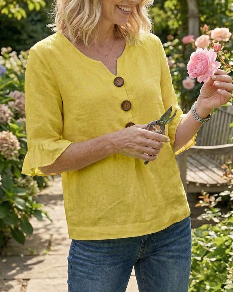 Janet | V-Neck Blouse with Wooden Buttons and Ruffled Sleeves