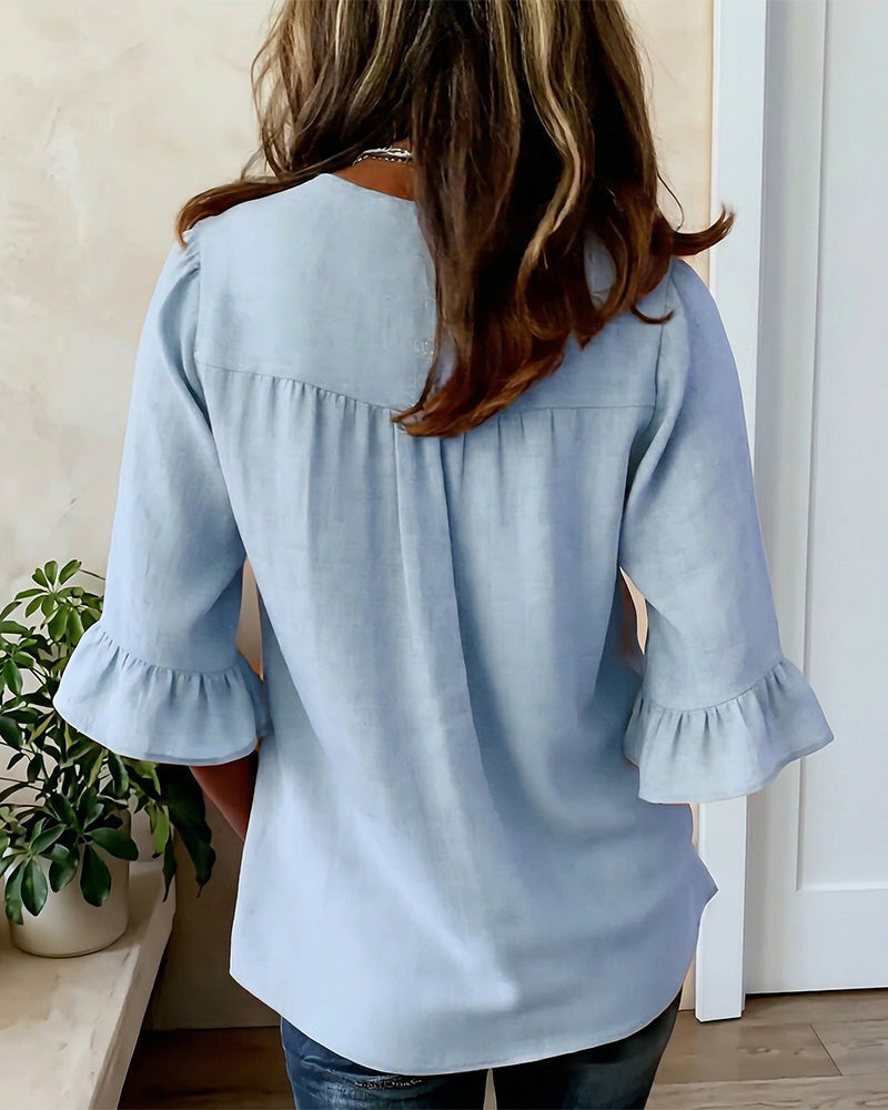 Janet | V-Neck Blouse with Wooden Buttons and Ruffled Sleeves